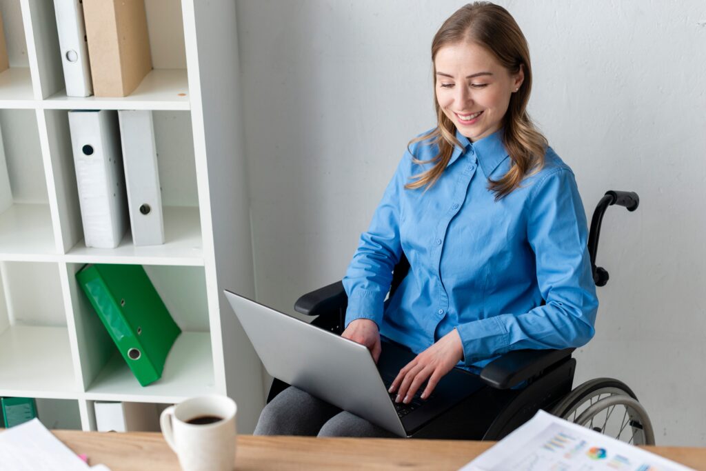 portrait-positive-young-woman-working-laptop